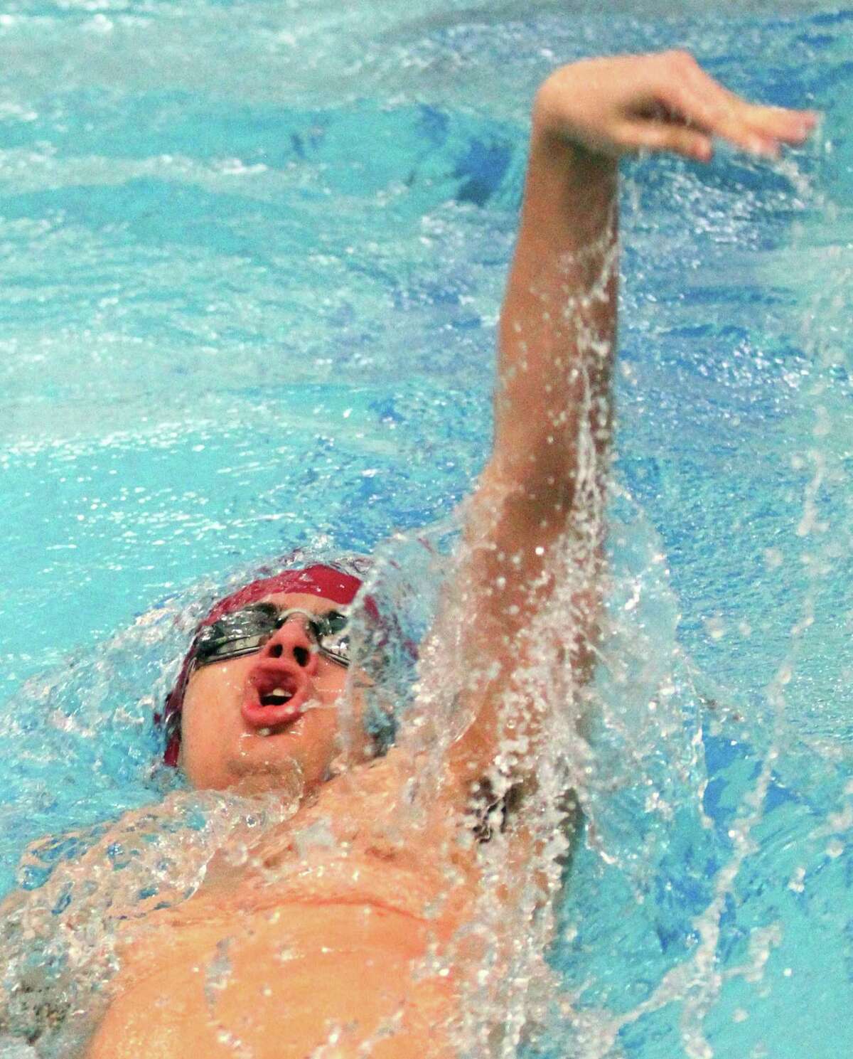 Milford's Bruno Sequera competes in the 200 yard medley relay during swim meet action against Bunnell/Stratford in Milford, Conn., on Thursday Jan. 24, 2019.