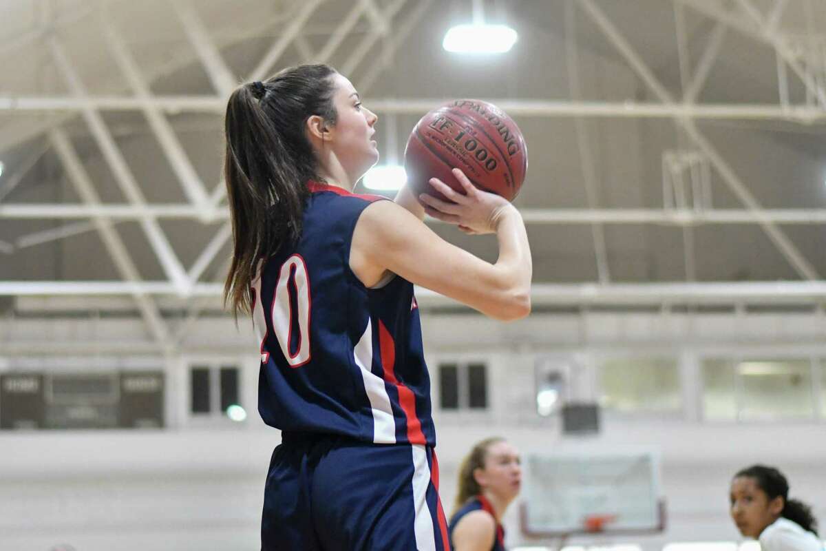 Allison Teklits (10) of the New Fairfield Rebels shoots a jump shot during a game against the Kolbe Cathedral Cougars on Thursday January 24, 2019 at The Shehan Center in Bridgeport, Connecticut.