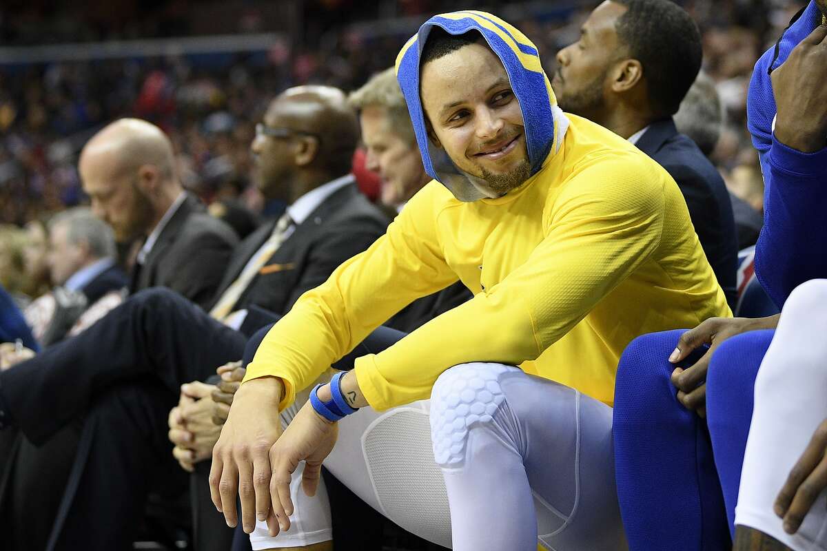 Stephen Curry of the Golden State Warriors smiles during a game