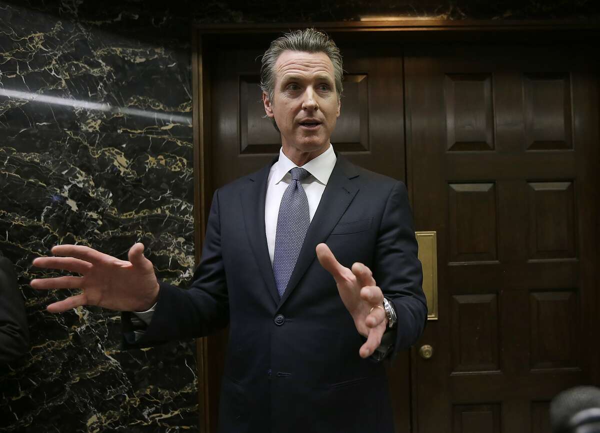 California Gov. Gavin Newsom discusses the results of an investigation that found Pacific Gas & Electric was not responsible for the Tubbs Fire, Thursday, Jan. 24, 2019, in Sacramento, Calif. State fire investigators released a report Thursday saying the deadly 2017 wildfire that scorched Napa and Sonoma counties was caused by a privately maintained electric lines. Newsom said it will be up to PG&E to decide whether to move ahead with a planned bankruptcy. (AP Photo/Rich Pedroncelli)