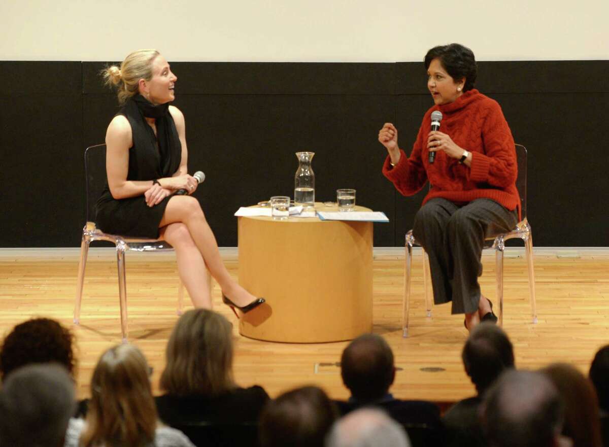 State Sen. Alex Bergstein, D-Greenwich, left, and PepsiCo Chairman Indra Nooyi speak during the Community Conversation at Greenwich Library's Cole Auditorium in Greenwich, Conn. Thursday, Jan. 24, 2019. The two discussed how to attract and retain businesses in Connecticut as a small group protested the proposal of tolls outside the event.
