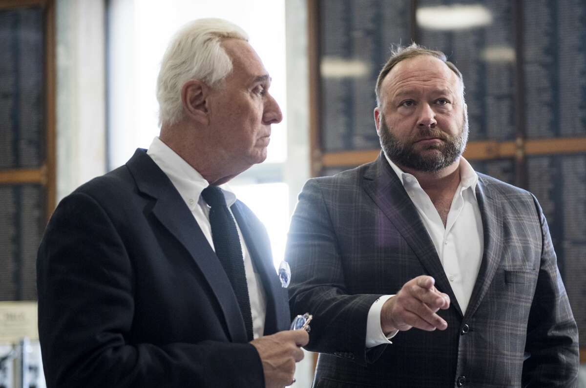 UNITED STATES - DECEMBER 11: Roger Stone, left, and Alex Jones hold a press conference before attending the House Judiciary Committee's hearing on "Transparency and Accountability: Examining Google and its Data Collection, Use and Filtering Practices" in the Rayburn House Office Building on Tuesday, Dec. 11, 2018. (Photo By Bill Clark/CQ Roll Call)