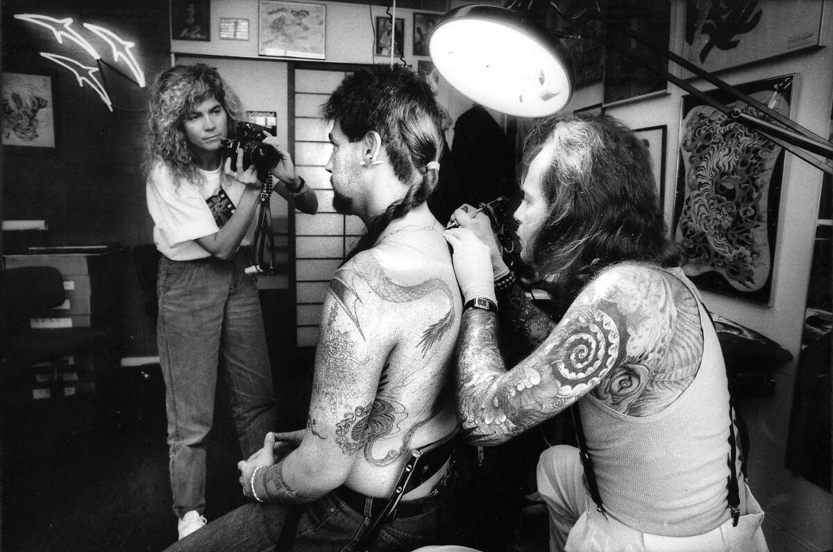 Debra Lex photographs Bill Salmon tattooing Christopher Pitman on April 29, 1988.