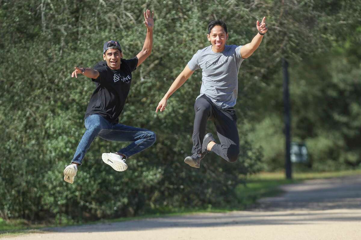 Julian Se ( left ) and Avi Ravishankar are the co-founders of "Muvve" a new fitness app they thought up while working out together Thursday, Jan. 24, 2019, in Houston.
