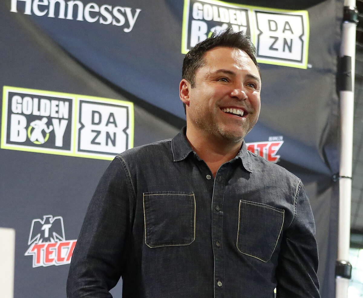 PHOTOS: A look at this week's boxing workouts, press conferences and weigh-ins Oscar De La Hoya, of Golden Boy Productions, is introduced to the crowd as Jaime Munguia and Takeshi Inoue weighed in at Pitch 25, Friday, Jan. 25, 2019, in Houston. Jaime Munguia, a 22-year-old who is one of the youngest champions in boxing and is thought to be on an eventual collision course with Canelo Alvarez. Munguia defends his title Saturday at Toyota Center.