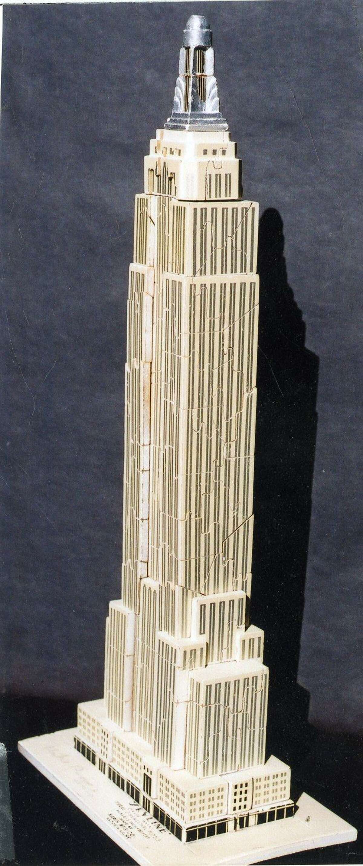 This three-dimensional puzzle of the Empire State Building was made by the Kawin Manufacturing Co. of Astoria, New York, around 1935. It's an example of the many puzzles created during the Depression era when they were popular.