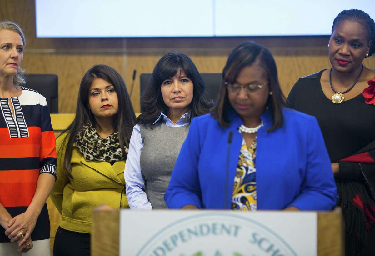 In this October 2018 file photo, Houston ISD trustees (LtoR) Sue Deigaard, Elizabeth Santos, Diana Dávila and Wanda Adams listen as Interim Superintendent Grenita Lathan addresses the media during a press conference at the Hattie Mae White Educational Support Center. Trustees apologized for the turmoil among the school board and stated that Lathan would continue to serve as the interim superintendent.