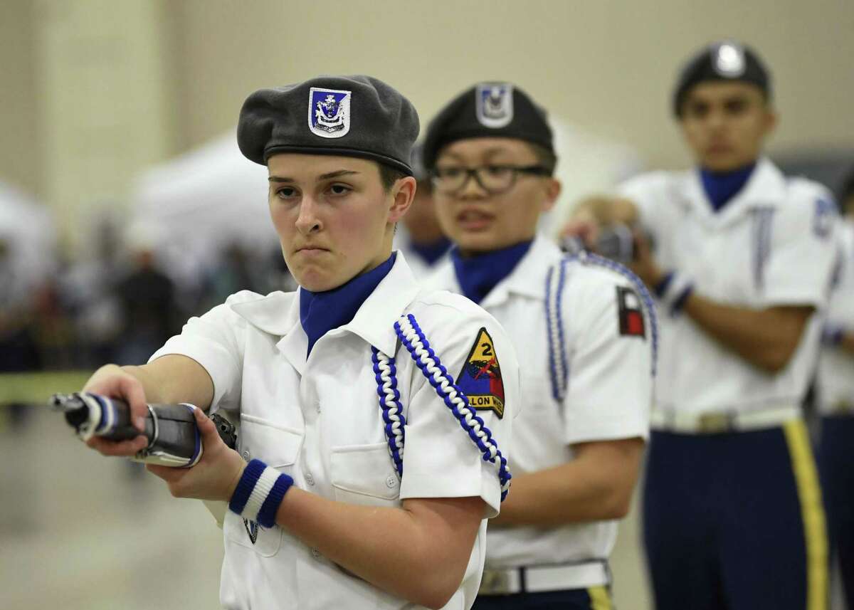 Sloan Cicognani of the MacArthur High armed drill team shows determination during the JROTC 5th Brigade Drill Team Championships at the Henry B. Gonzalez Convention Center on Saturday, Jan. 26, 2019.