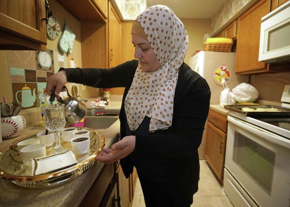 Amal Karkoura prepares coffee at her Gulfton area apartment Friday, Jan. 25, 2019, in Houston. The Gulfton area has one of the highest concentrations of struggling households in the city of Houston according to a new report from United Way.