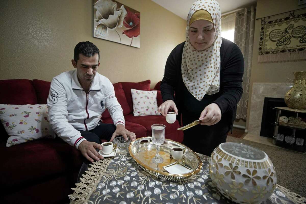 Mohamad Khir Alakish and his wife, Amal Karkoura, have coffee in their Gulfton area apartment Friday, Jan. 25, 2019, in Houston. The Gulfton area has one of the highest concentrations of struggling households in the city of Houston according to a new report from United Way.