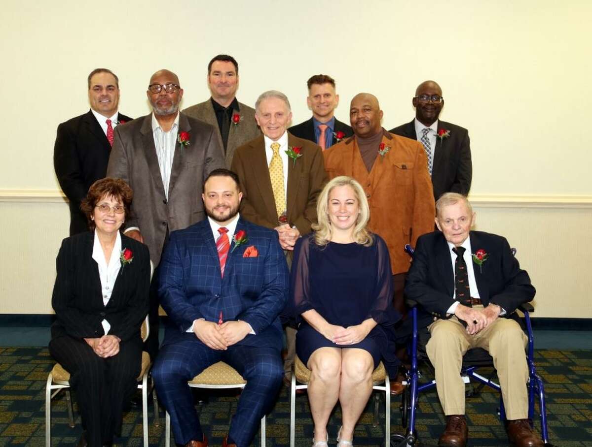The 11 individual inductees for the Middletown Hall of Fame are pictured. Front row, from left, are Mary Mesek, Nick Puorro, Danielle Benoit-Egidio and Fred Norton. Second row standing, from left, are John Raba, Ron Edens for Dan Thompson (posthumous), Hugh O'Gorman, Robert Trigo, Matt Moravek, Rodney Privott and Otis Rankins.