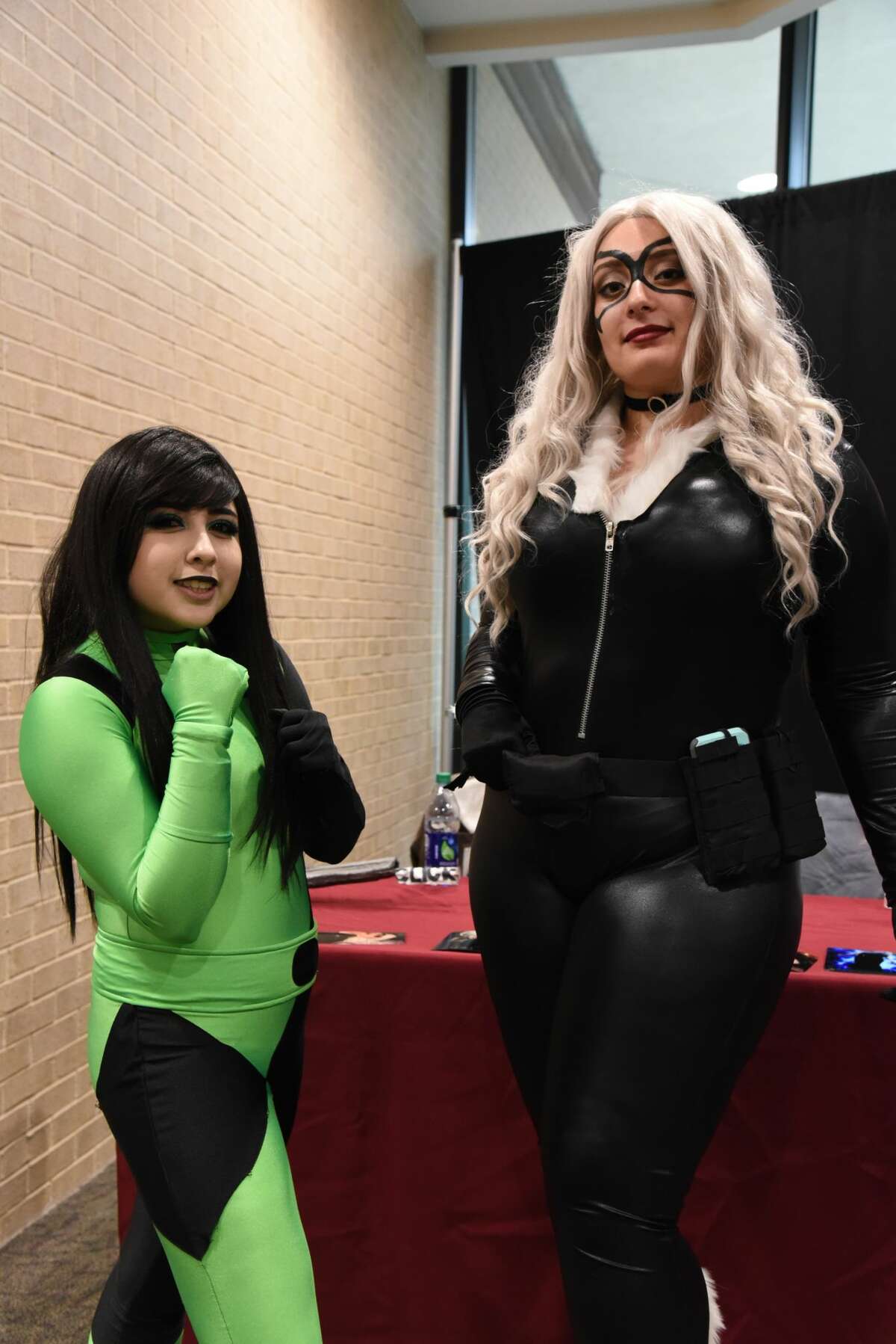 Cosplayers pose for a photo during the Laredo STCE's Comic Con.
