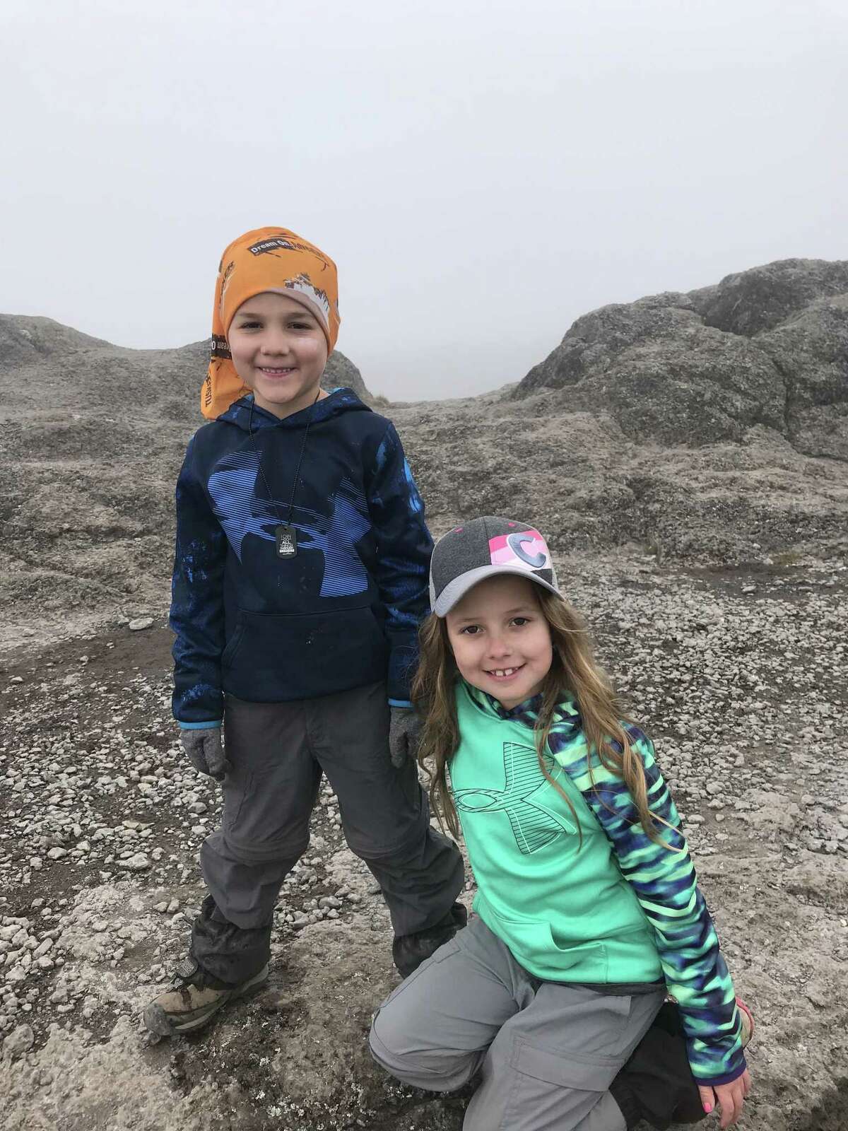 Joel and Charli Redmond say they were thrilled to reach the summit on Mount Kilimanjaro with their parents. “I was so happy because I wasn’t climbing uphill anymore,” Joel says. Charli’s response: “Yay! We made it.”