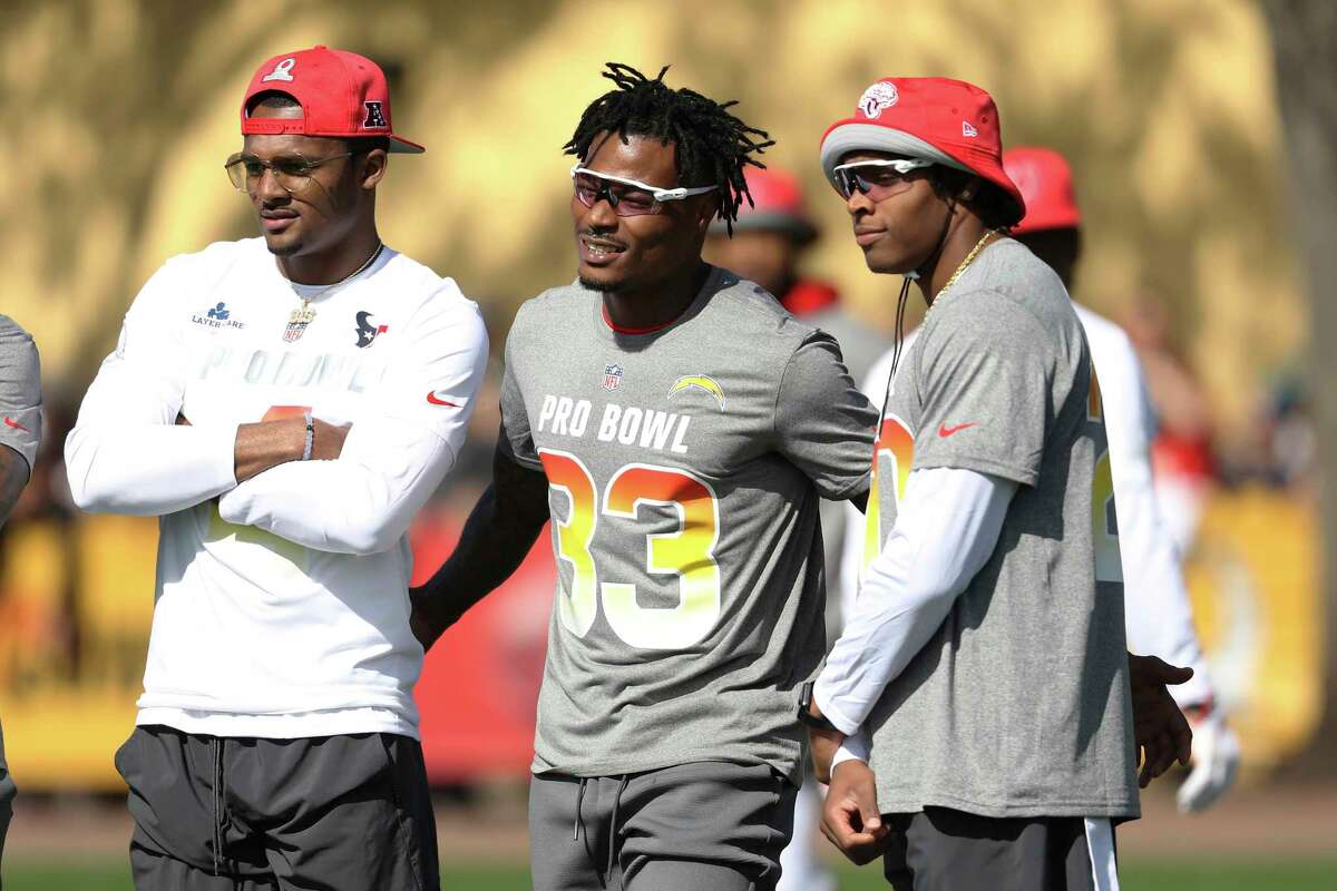 From left, AFC quarterback Deshaun Watson, AFC safety Derwin James, and AFC cornerback Jalen Ramsey pose for a photo during Pro Bowl NFL football practice, Friday, Jan. 25, 2019, in Kissimmee, Fla. (AP Photo/Steve Luciano)