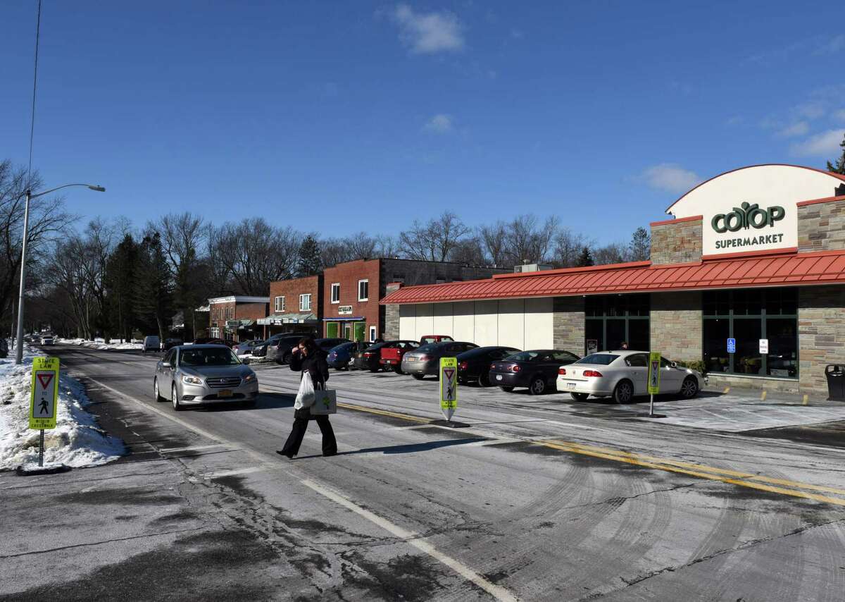 Shoppers cross Nott Street near the Niskayuna Co-op supermarket on Monday, Jan. 28, 2019, in Niskayuna, N.Y. Schenectady County, with support from the Town of Niskayuna, has secured a $1.5 million federal grant to improve Nott Street in the area between Balltown Road and Clifton Park road. The goal is to reduce accidents, improve safety pedestrian safety and support accessibility for local businesses. (Will Waldron/Times Union)