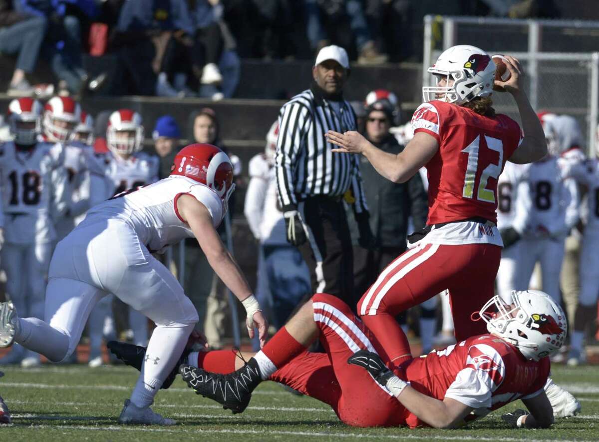 Greenwich quarterback Gavin Muir (12) has committed to Dartmouth, where he will continue his football career.