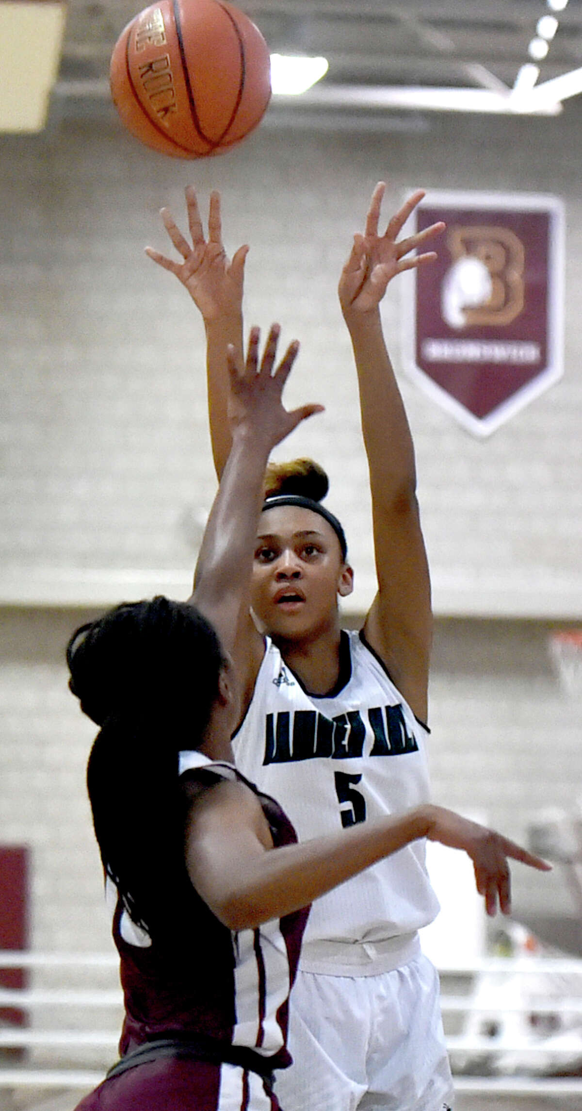 New Haven, Connecticut - Monday, January 28, 2019: Jayda Johnson of Hamden Hall takes a jump shot during first-half basketball Monday at Hopkins.