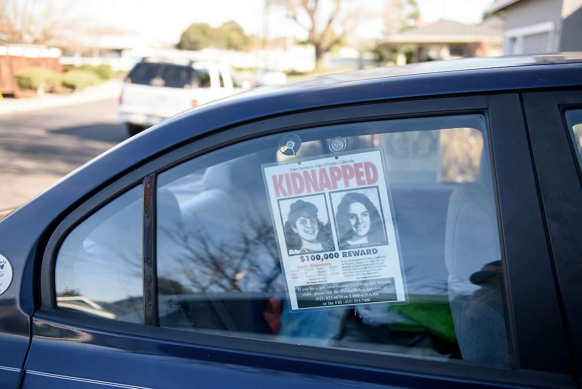 A poster offering a reward for Maddi and Mike Misheloff's kidnapped daughter Ilene Misheloff is seen in the window of a car at their home in Dublin, Calif., on Wednesday, January 23, 2019. Maddi and Mike Misheloff are marking the 30-year-anniversary of their daughter's kidnapping. Ilene Misheloff was 13-years-old when she was kidnapped while she walked home from school in Dublin in 1989.