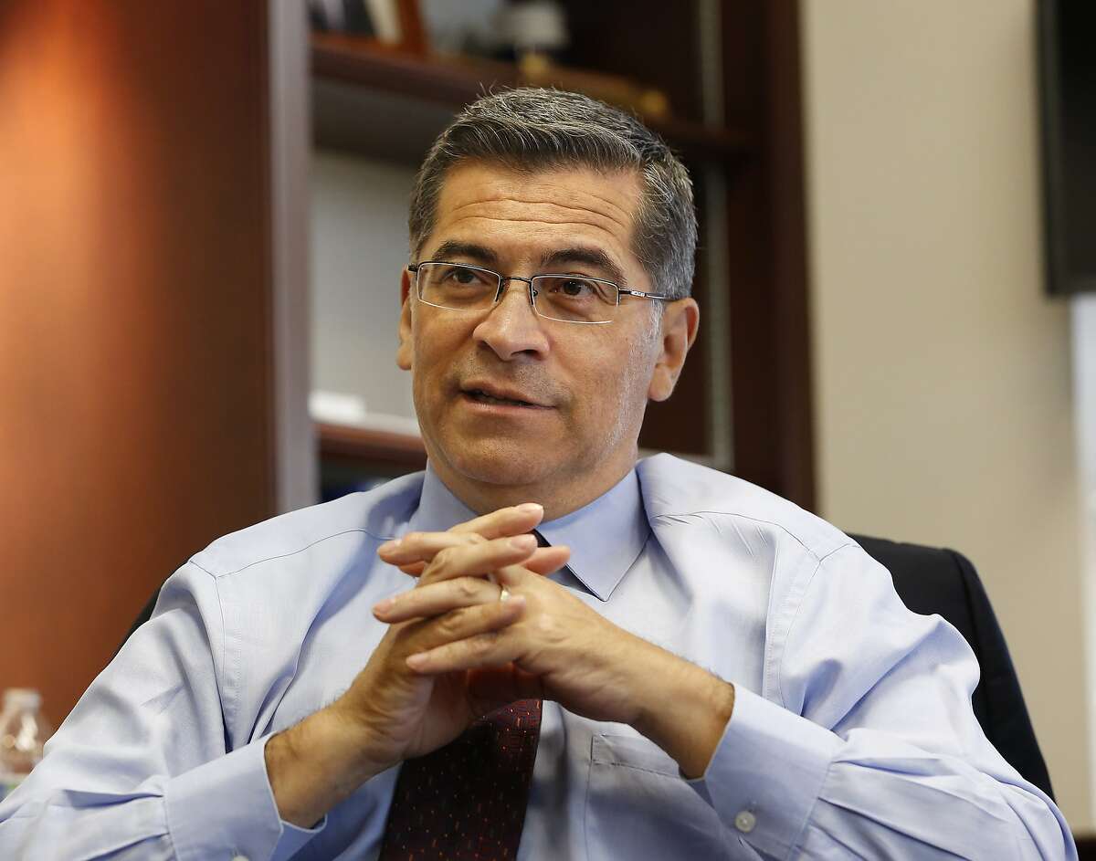 FILE - In this Oct. 10, 2018, file photo, California Attorney General Xavier Becerra discusses various issues during an interview with The Associated Press, in Sacramento, Calif. Becerra, California’s top prosecutor, has been among the most aggressive of the Democratic state attorneys general who have fought President Donald Trump in court. Becerra said he looks to defend issues he championed as a 12-term Congressman and listens to what the president says to prepare for future litigation. (AP Photo/Rich Pedroncelli, File)