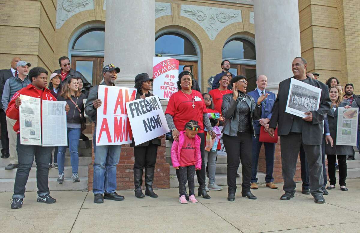 Protestors gathered outside the Fort Bend County Courthouse on Martin Luther King, Jr. Day to rally against plans to re-locate the remains of 95 convict prisoners found at a historic grave site in Sugar Land.