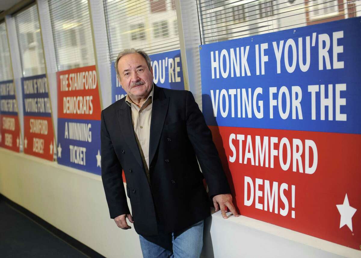 Stamford Democratic City Committee Chairman John Mallozzi poses at the Stamford Democratic Headquarters in Stamford, Conn. Monday, Dec. 1, 2014.