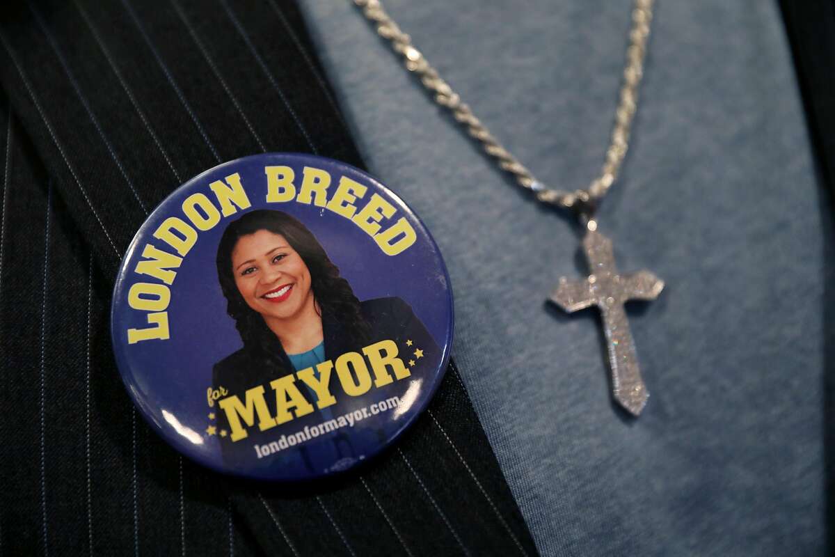 Sam Manneh, a friend of San Francisco Mayor London Breed, wears a button bearing her image after she delivered her State of the City address at the National LGBTQ Center for the Arts in San Francisco, Calif., on Wednesday, January 30, 2019. Manneh said he and Breed served as interns together for former Mayor Willie Brown at the Office of Neighborhood Services.