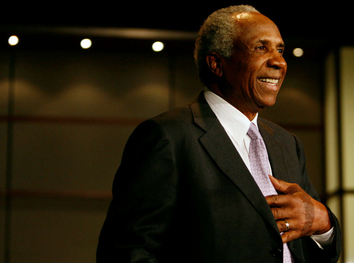 Hall of Fame player and Major League Baseball's first black manager Frank Robinson accepts the inaugural George Washington University Jackie Robinson Society Community Recognition Award for his contributions to baseball Thursday, April 12, 2007, at George Washington University in Washington. (AP Photo/Jacquelyn Martin)