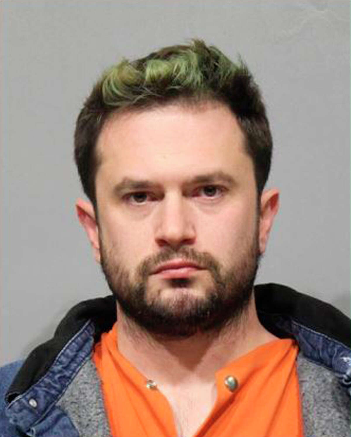 In this photo released by the Washtenaw County Jail, Scott Walters, is shown in Ann Arbor, Mich. Walters, and his spouse, David Daniels, a University of Michigan professor and world-famous opera countertenor, were arrested Tuesday, Jan. 29, 2019 in Ann Arbor, Mich., on allegations that they sexually assaulted a singer in Houston in 2010. (Washtenaw County Jail via AP)