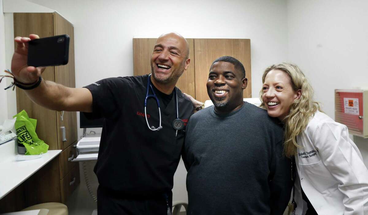 Dr. Fadi Abouzahr takes a selfie on Jan. 29, 2019, with Troy Mathis and Dr. Elizabeth Thomas. Mathis received a kidney from the nephew of his brother-in-law, 19-year-old Hezekiah Williams, who had been mortally wounded in a shooting. Thomas performed the transplant operation at University Hospital. Abouzahr is Mathis’ kidney doctor.