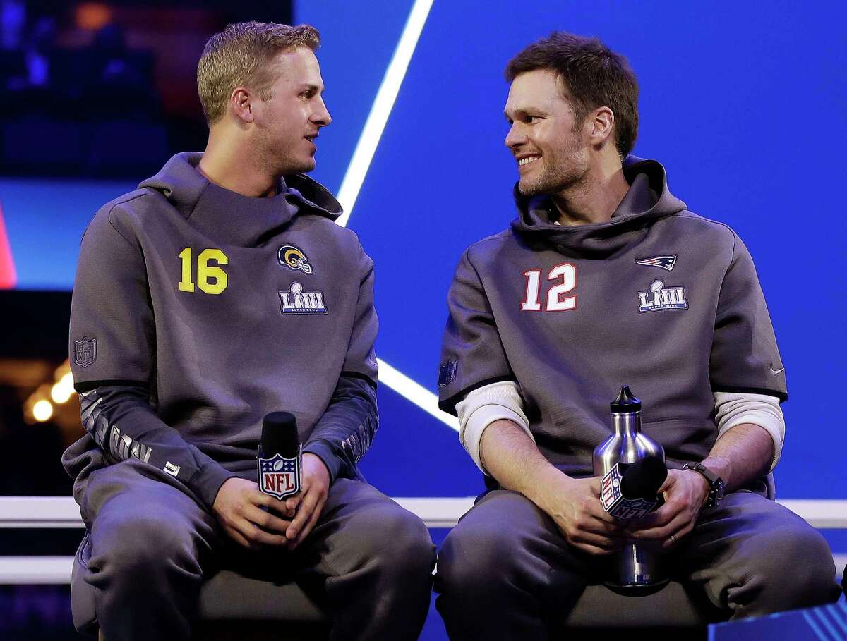 Tom Brady (right) and the Patriots are a slight favorite over Jared Goff's Rams in Sunday's Super Bowl LIII.