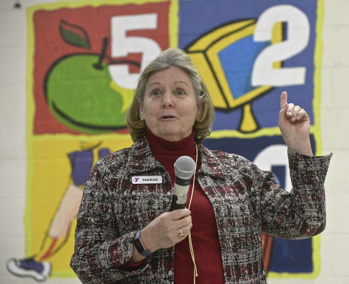 Marie Miszewski, President/CEO of the Regional YMCA of Western Connecticut unveiled a new mural at Morris Street Elementary School Thursday evening with Anthem who provided the YMCA with a $25,000 grant to support the program Go!-5-2-1-0. January 31, 2019, in Danbury, Conn.