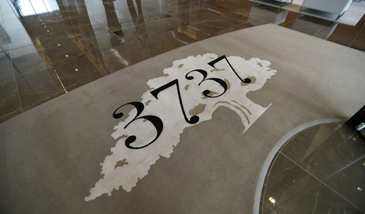 A rug with the 3737 logo in PMRG's new office tower at 3737 Buffalo Speedway, Wednesday, Oct. 5, 2016 in Houston. ( Karen Warren / Houston Chronicle )