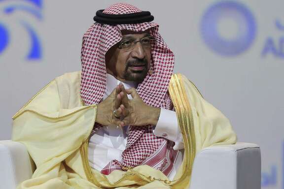 FILE - In this Nov.12, 2018 file photo, Khalid Al-Falih, Saudi Energy and Oil Minister, speaks at the Abu Dhabi International Exhibition &amp; Conference, in Abu Dhabi, United Arab Emirates. Al-Falih said Sunday, Jan. 13, 2019, at the Atlantic Council's Global Energy Forum in Abu Dhabi that he's not happy with the "range of volatility" seen over the past two to three years. Cautious not to set a price target or range for oil, he explained there are consequences when energy prices dip too low or rise too high. (AP Photo/Kamran Jebreili, File)