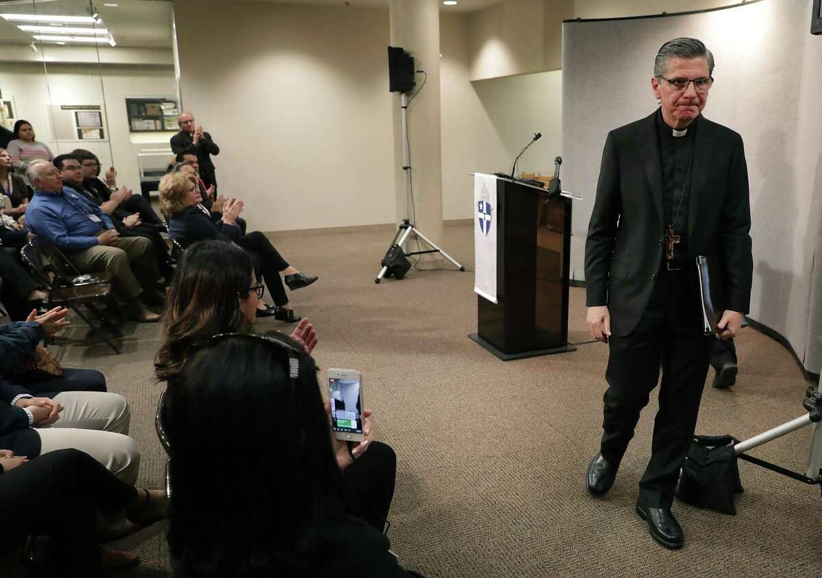 Archbishop Gustavo Garcia-Siller walks away after addresses the people of the archdiocese releasing the report on priests accused of sexual abuse of minors since 1947, on Thursday, Jan. 31, 2019.