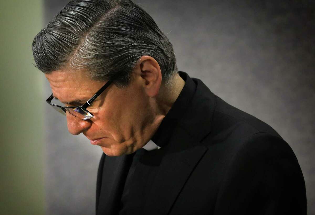 Archbishop Gustavo Garcia-Siller fights back emotions as he reads a statement about the report on priests accused of sexual abuse of minors since 1947, on Thursday, Jan. 31, 2019.