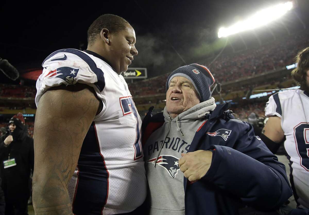 New England Patriots offensive tackle Trent Brown (77) celebrates with head coach Bill Belichick after defeating the Kansas City Chiefs in the AFC Championship NFL football game, Sunday, Jan. 20, 2019, in Kansas City, Mo. (AP Photo/Elise Amendola)