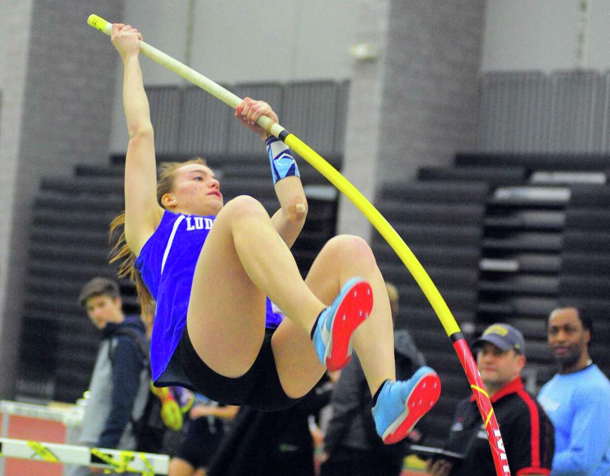 Fairfield Ludlowe's Laurel Blackman competes in the pole vault during FCIAC Track Championship action in New Haven, Conn., on Thursday Jan. 31, 2019.
