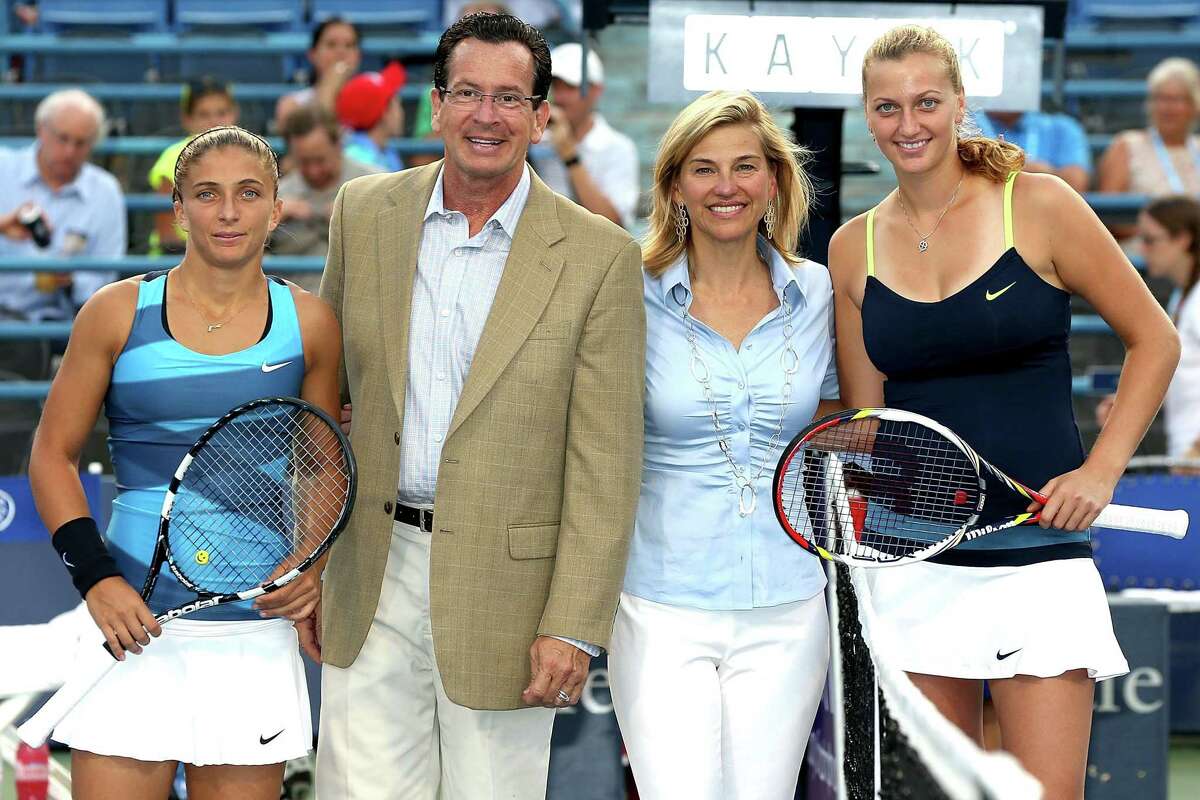 Sara Errani of Italy (L) and Petra Kvitova (R) of Cezch Republic pose at the net with Gov. Dannel P. Malloy and New Haven Open at Yale Tournament Director Anne Worcester after the coin toss during the semifinals at the Connecticut Tennis Center at Yale on August 24, 2012.