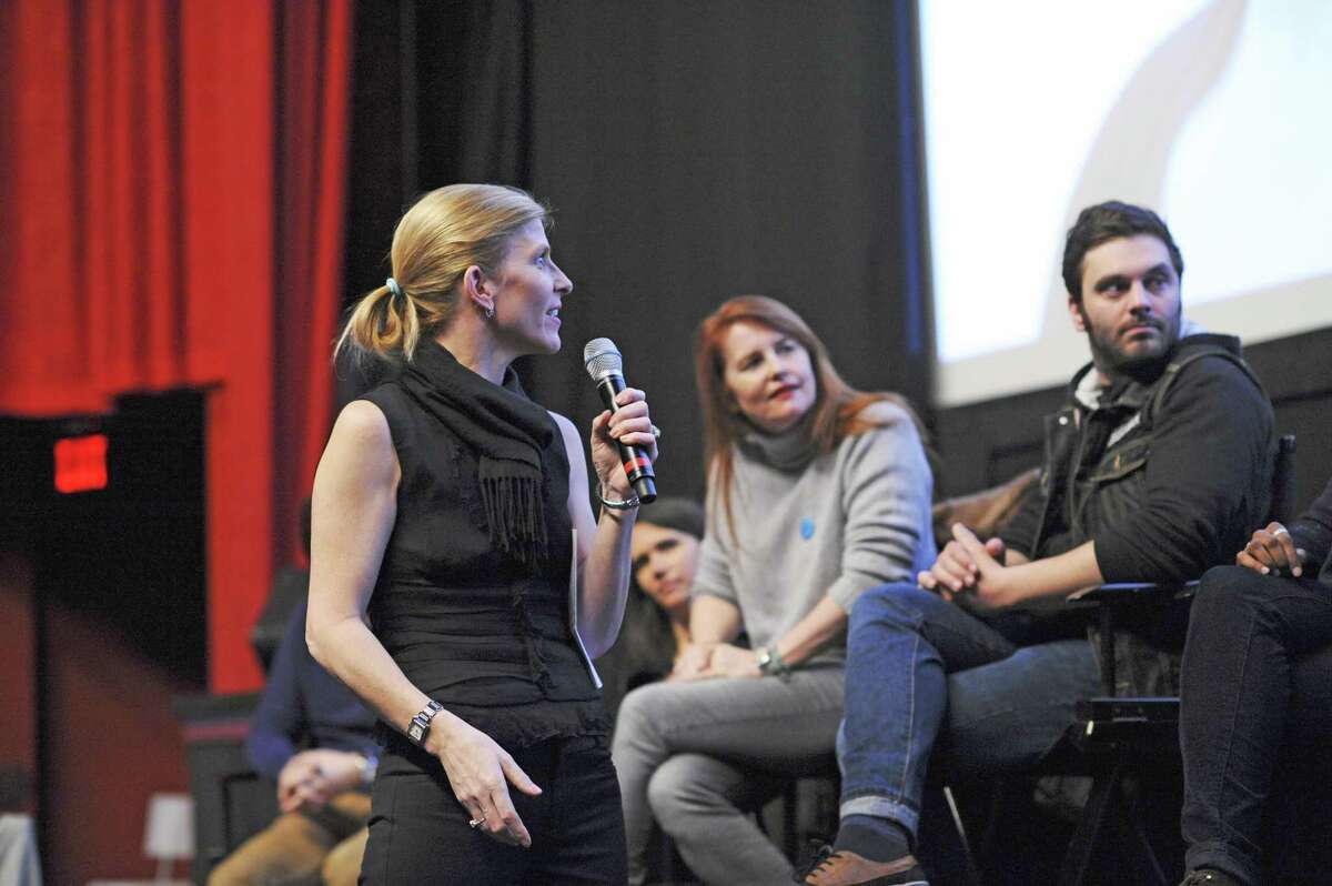 Anne Kern, on left, engages the creative team of the film ”Once in a Lifetime” post screening at a previous Focus on French Cinema film festival. In the center is the film director, Marie-Castille Mention-Schaar, with actor who played a student in the film.