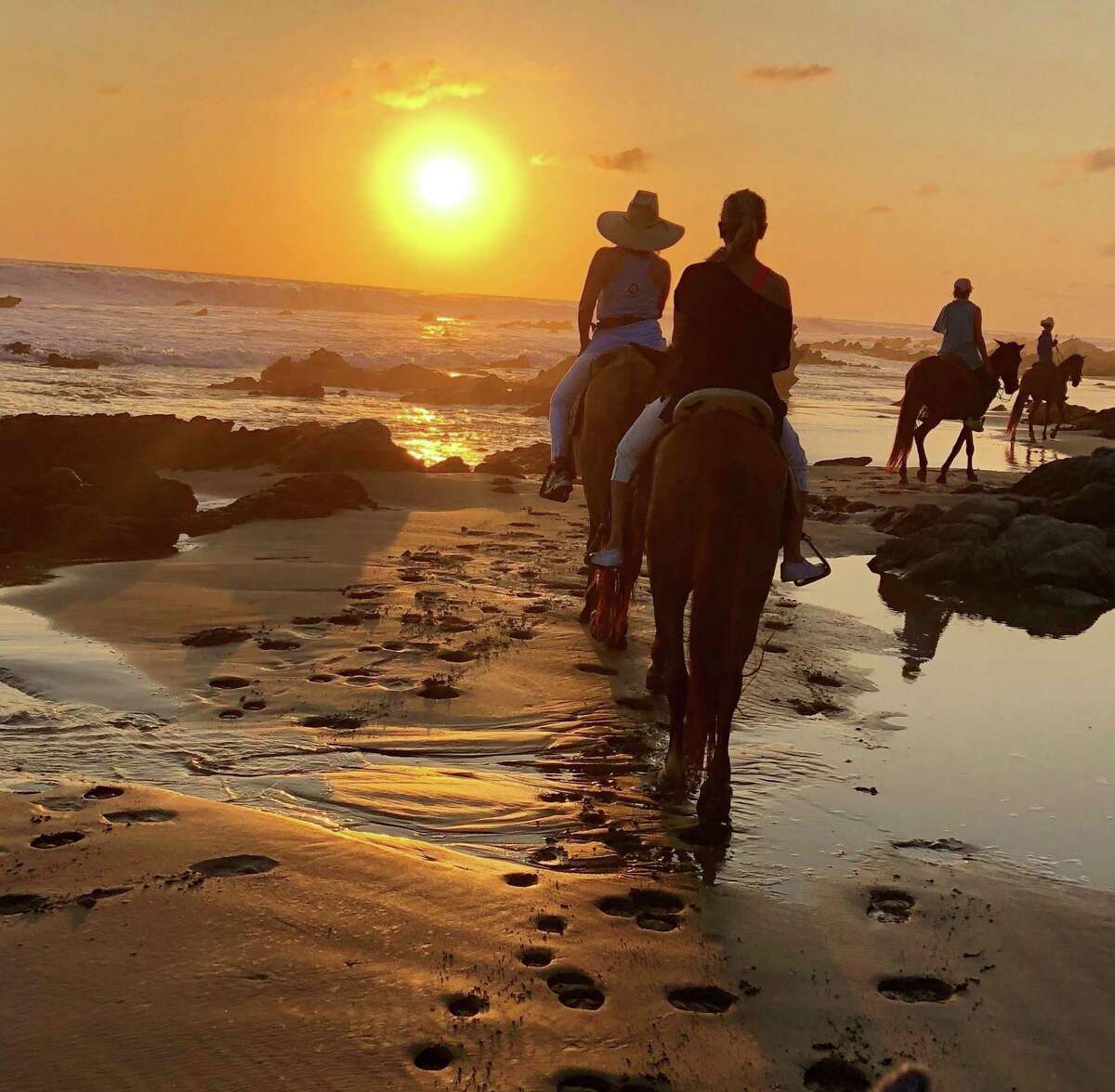An end-of-the day horseback ride during the Austin Next Tribe group's yoga, writing and photography retreat in Troncones, Mexico