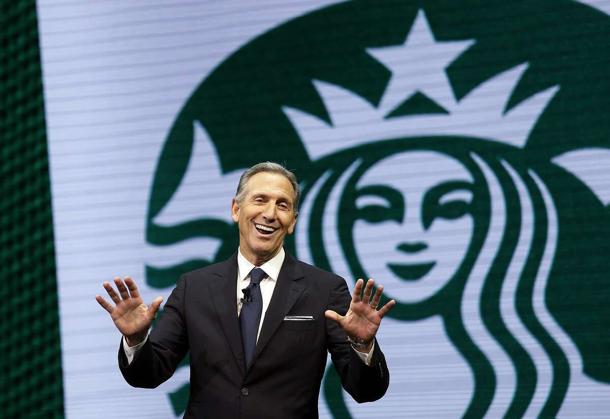 FILE - In this March 22, 2017 file photo, Starbucks CEO Howard Schultz speaks at the Starbucks annual shareholders meeting in Seattle. Schultz spent more than 30 years at Starbucks, growing a handful of coffee shops into a much-admired global brand. But now, as the billionaire mulls running for president as an independent, Starbucks will have to tread carefully. (AP Photo/Elaine Thompson, File)