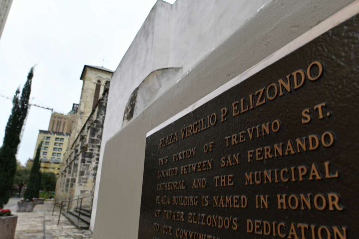 A plaque at San Fernando Cathedral that honors Virgilio Elizondo, who was rector of San Fernando Cathedral, marks an alley called Elizondo Way. . Elizondo was accused of sexual abuse. He died by suicide in 2016.