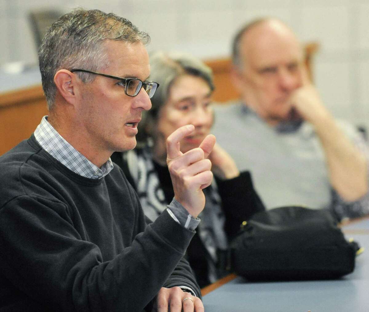 Norwalk resident Kevin Cane attends a forum at Norwalk Community College Thursday, January 31, 2019, to ask Rep. Lucy Dathan, Sen. Bob Duff and Sen. Will Haskell about their perspectives different issues at the college in Norwalk, Conn.
