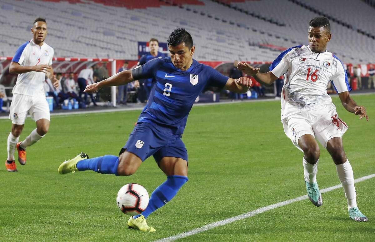 FILE - In this Sunday, Jan. 27, 2019, file photo, United States defender Nick Lima (2) gets set to kick the ball as Panama midfielder Edson Samms (16) and defends during the second half of an international friendly soccer game in Phoenix. A new coach with a new system brings new opportunities for several players looking to make the most of that chance for the U.S. men's national soccer team. Lima seized that moment in his national team debut against Panama in the first game under new U.S. coach Gregg Berhalter and looks to build on that Saturday when the Americans complete their January camp with a game against Costa Rica at Avaya Stadium. (AP Photo/Ross D. Franklin, File)