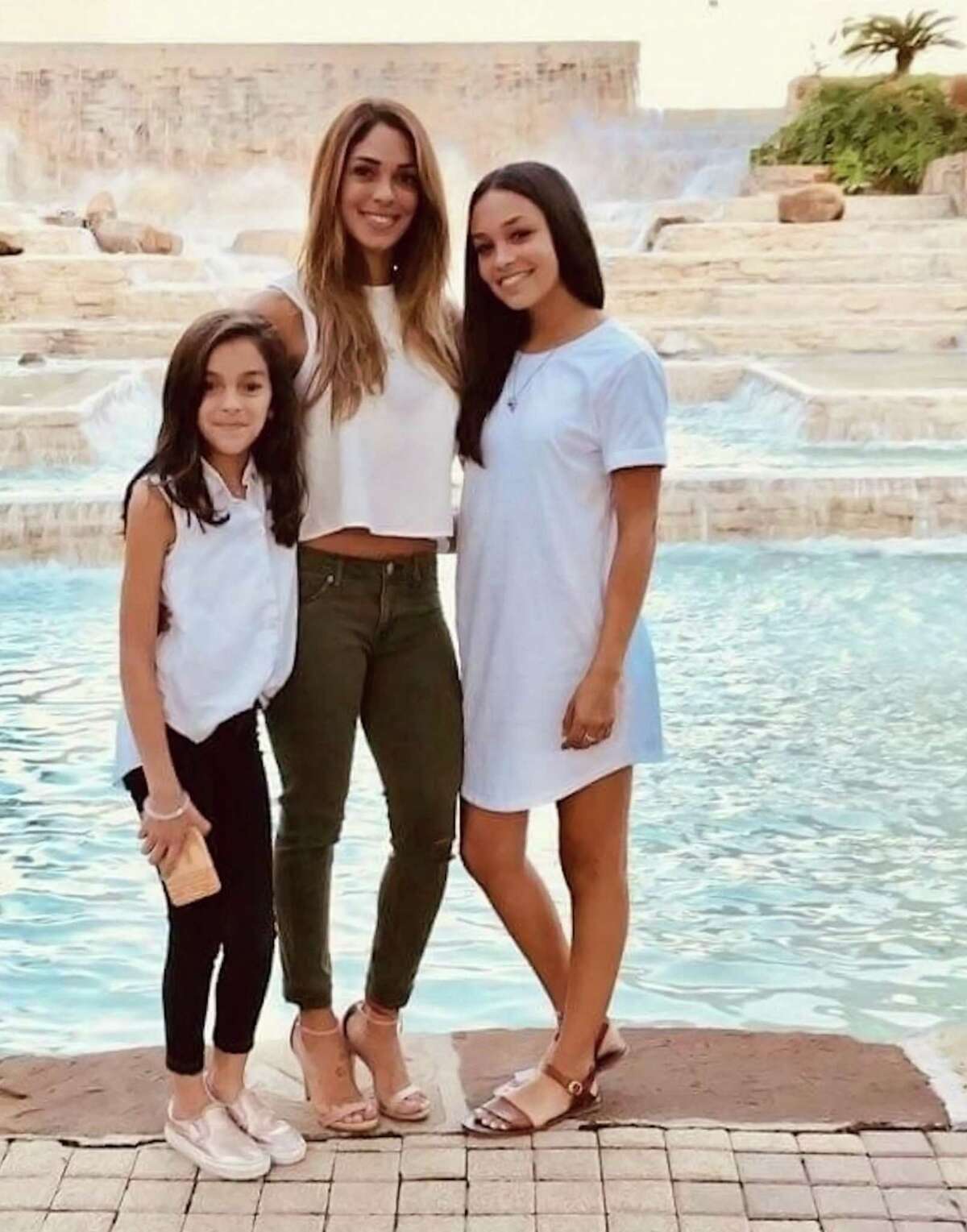 Nichol Leila Olsen is shown with her daughters London Sophia Bribiescas, left, and Alexa Denice Montez, right. The three were found shot to death in a luxury home in a gated neighborhood near Leon Springs on Jan. 10.