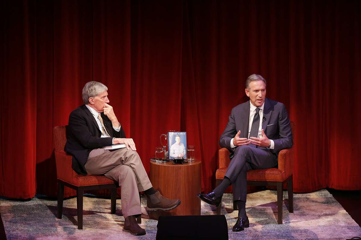 From left: Moderator Roy Eisenhardt hosts former Starbucks CEO Howard Schultz during a program at the Jewish Community Center on Friday, Feb. 1, 2019, in San Francisco, Calif. Schultz promoted his new book, “From the Ground Up: A Journey to Reimagine the Promise of America.”