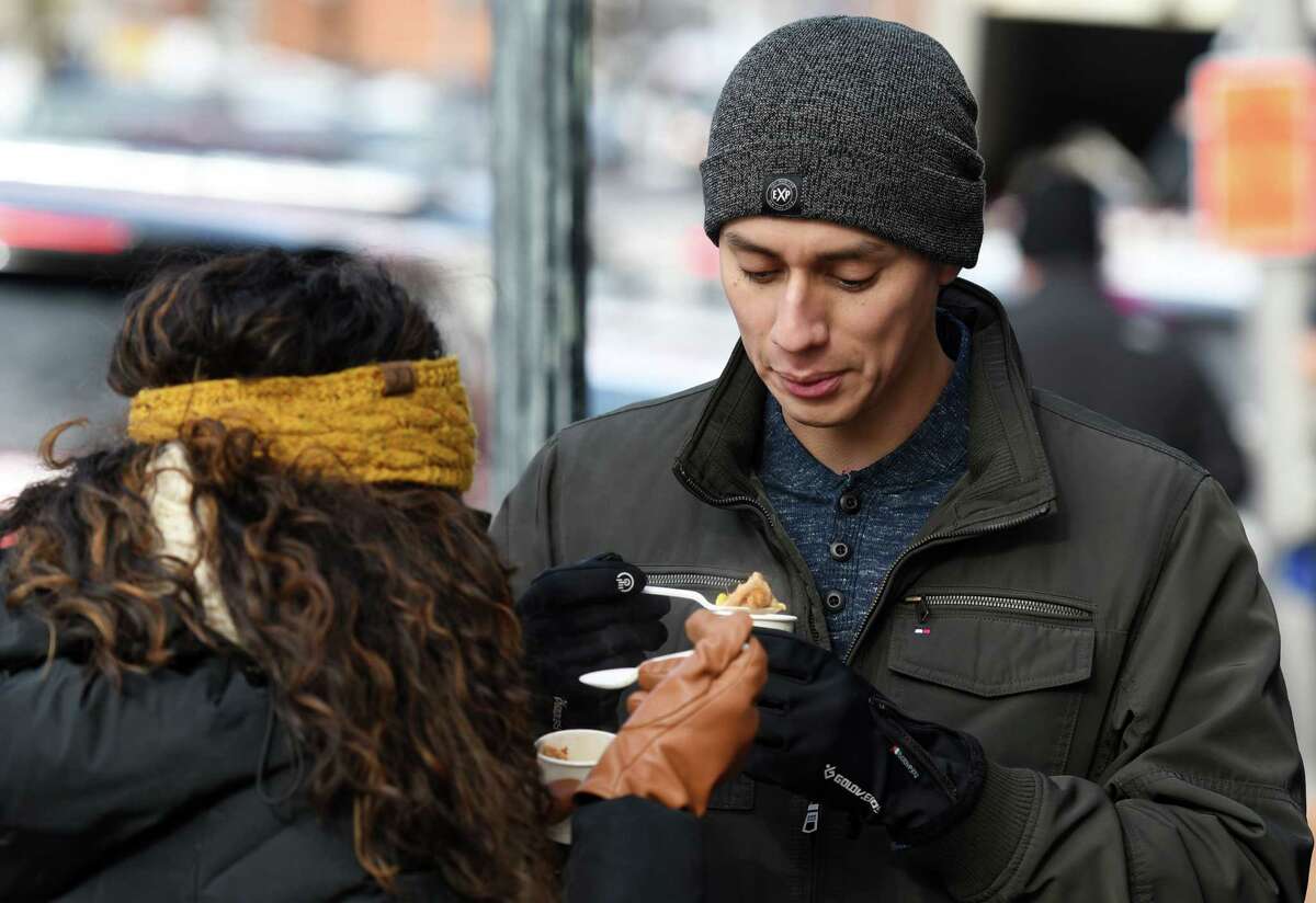 Walter Salas blows on his chowder to cool it down during Saratoga Chowderfest Saturday, Feb. 2, 2019 in Saratoga Springs, NY. (Phoebe Sheehan/Times Union)