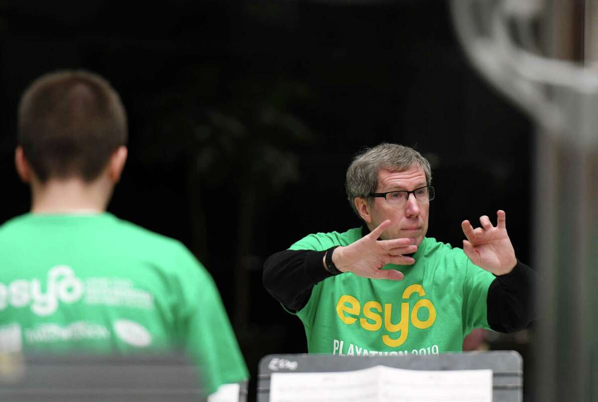 ESYO Conductor of Percussion Mark Foster leads the Percussion Ensembles during the Empire State Youth Orchestra Playathon Fundraiser Saturday, Feb. 2, 2019 at Crossgates Mall in Albany, NY. (Phoebe Sheehan/Times Union)