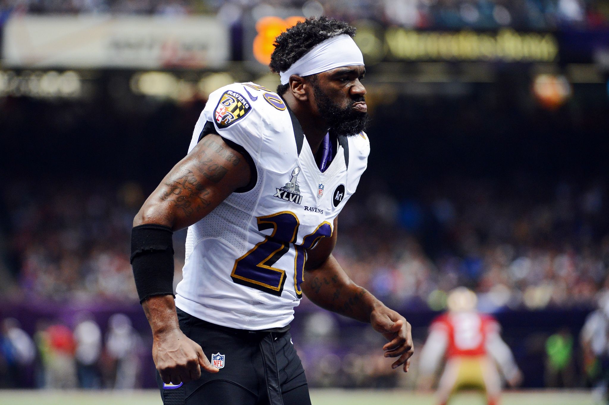 FILE - In this Feb. 3, 2013, file photo, Baltimore Ravens free safety Ed  Reed (20) holds the Vince Lombardi Trophy after the Ravens defeated the San  Francisco 49ers in the NFL