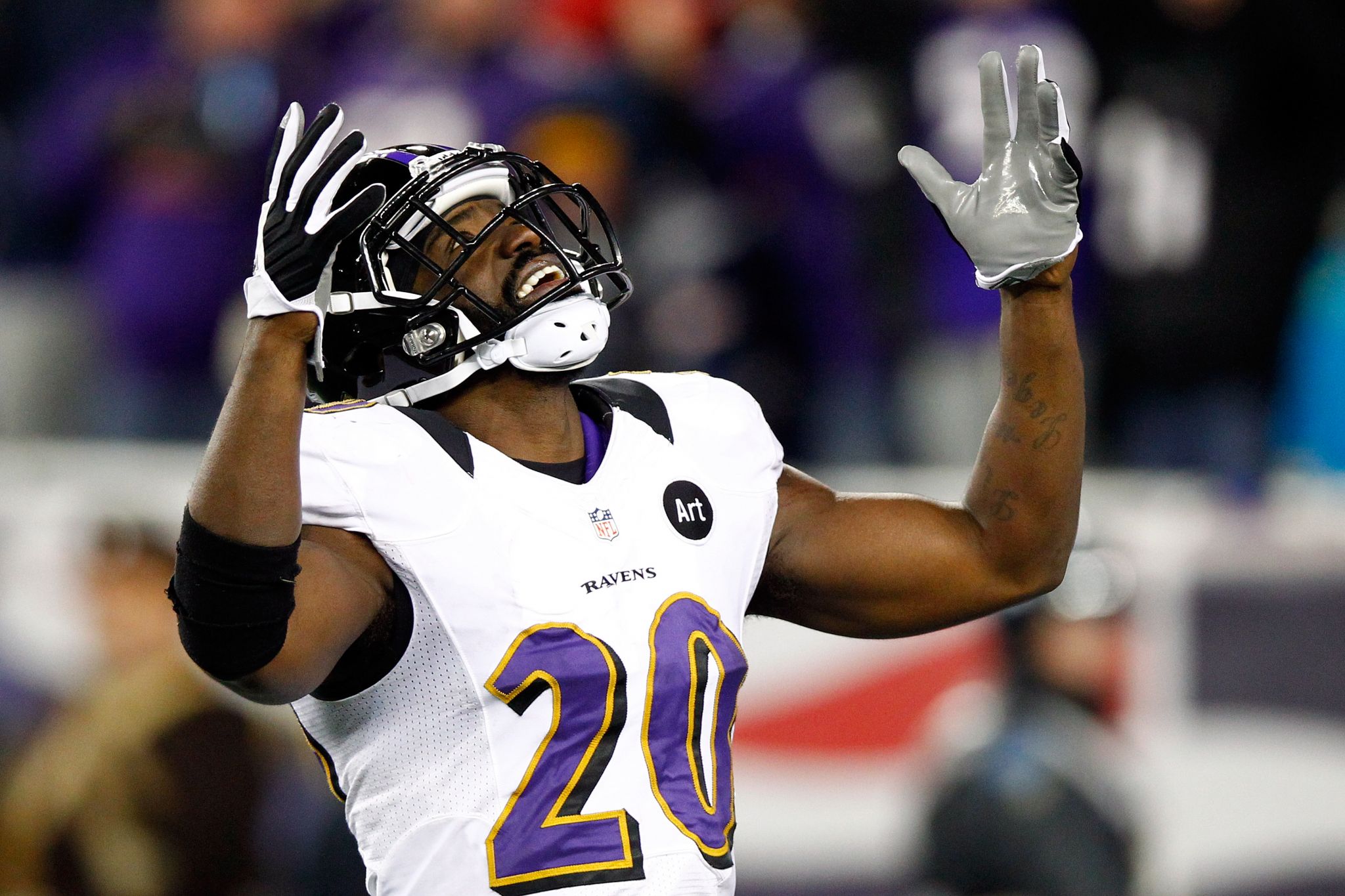 Baltimore Ravens safety Ed Reed celebrates with the Lombardi